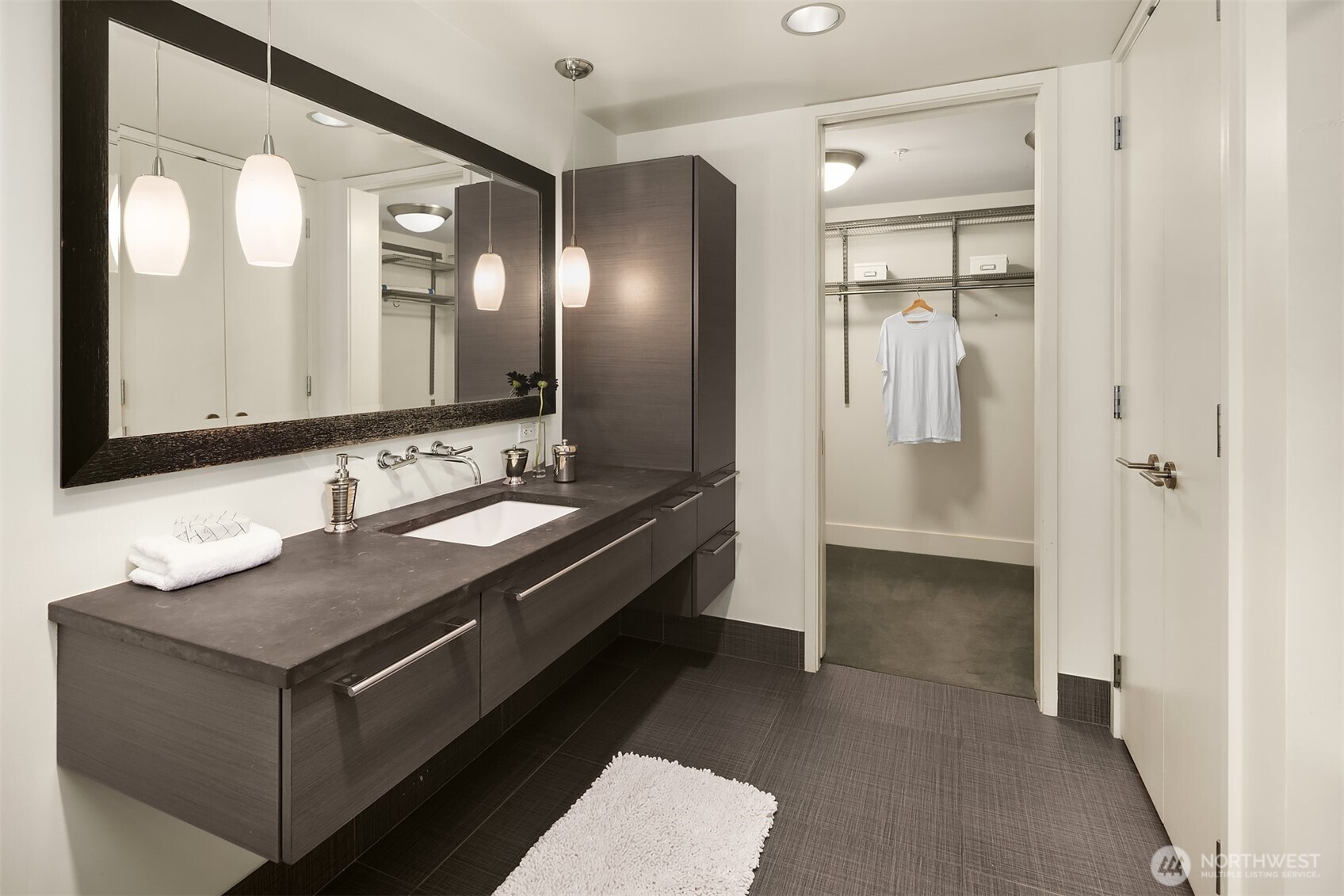 Bathroom opens up to walk in closet