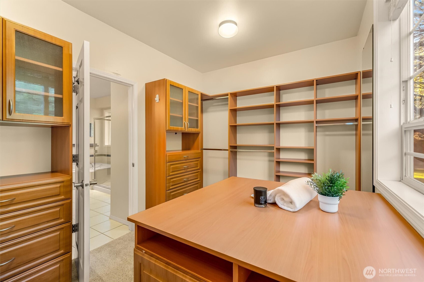 Primary bathroom with soaking tub, double sinks, and walk in shower