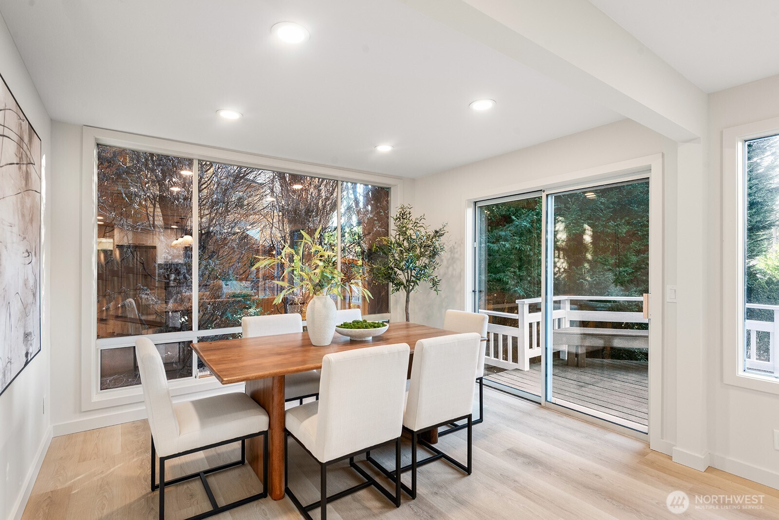 Large kitchen eating area with deck access