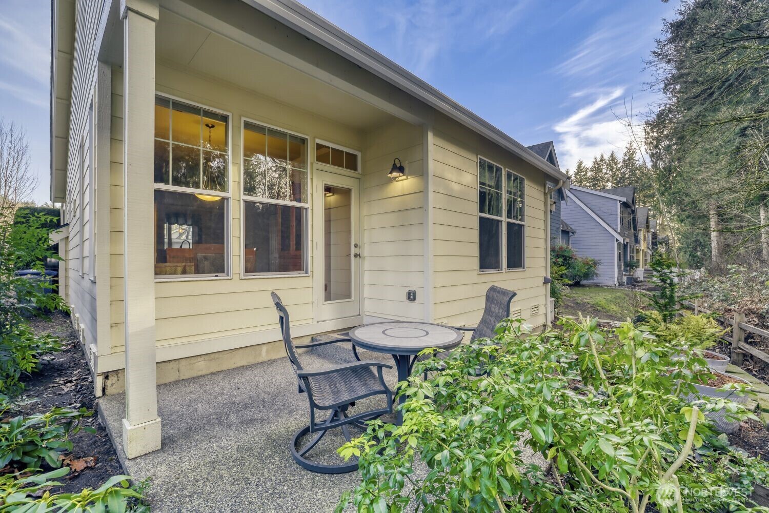 Serene back porch connecting to the nature preserve. Peaceful living. Watch the birds, enjoy the sunshine and more.