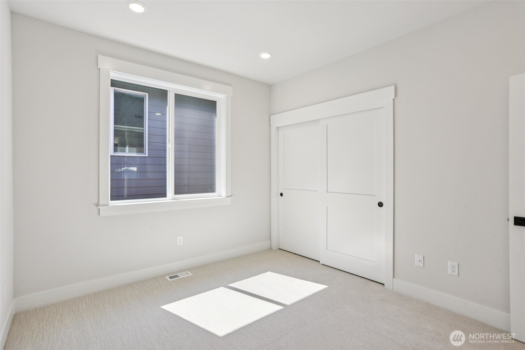 2nd bedroom on 3rd level with double door entry can also serve as an open loft space