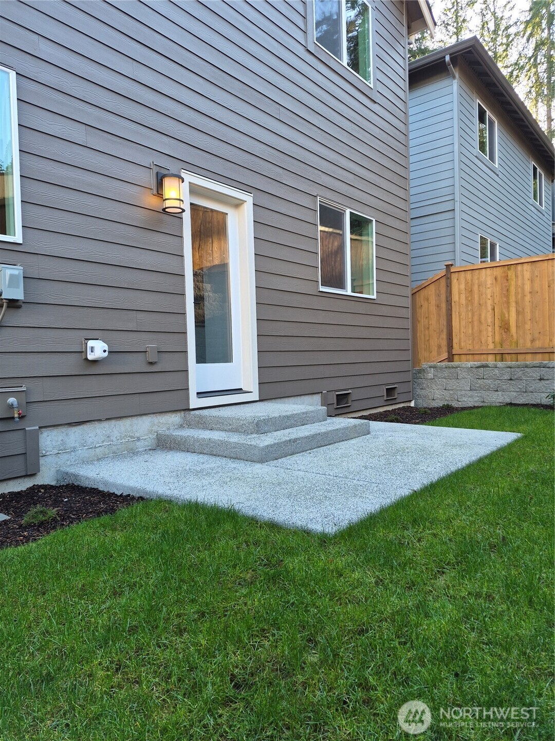 Fully landscaped rear yard is ready for your personal touch.