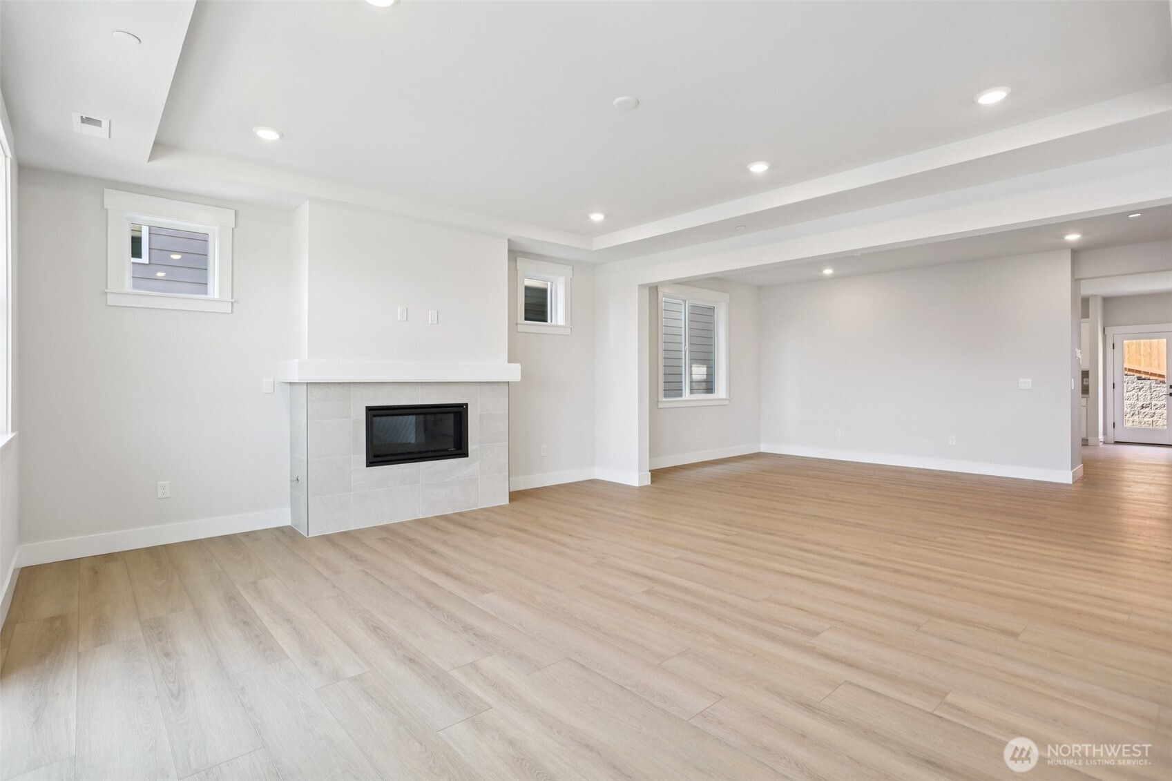 Gas fireplace warms the great room/dining room area.