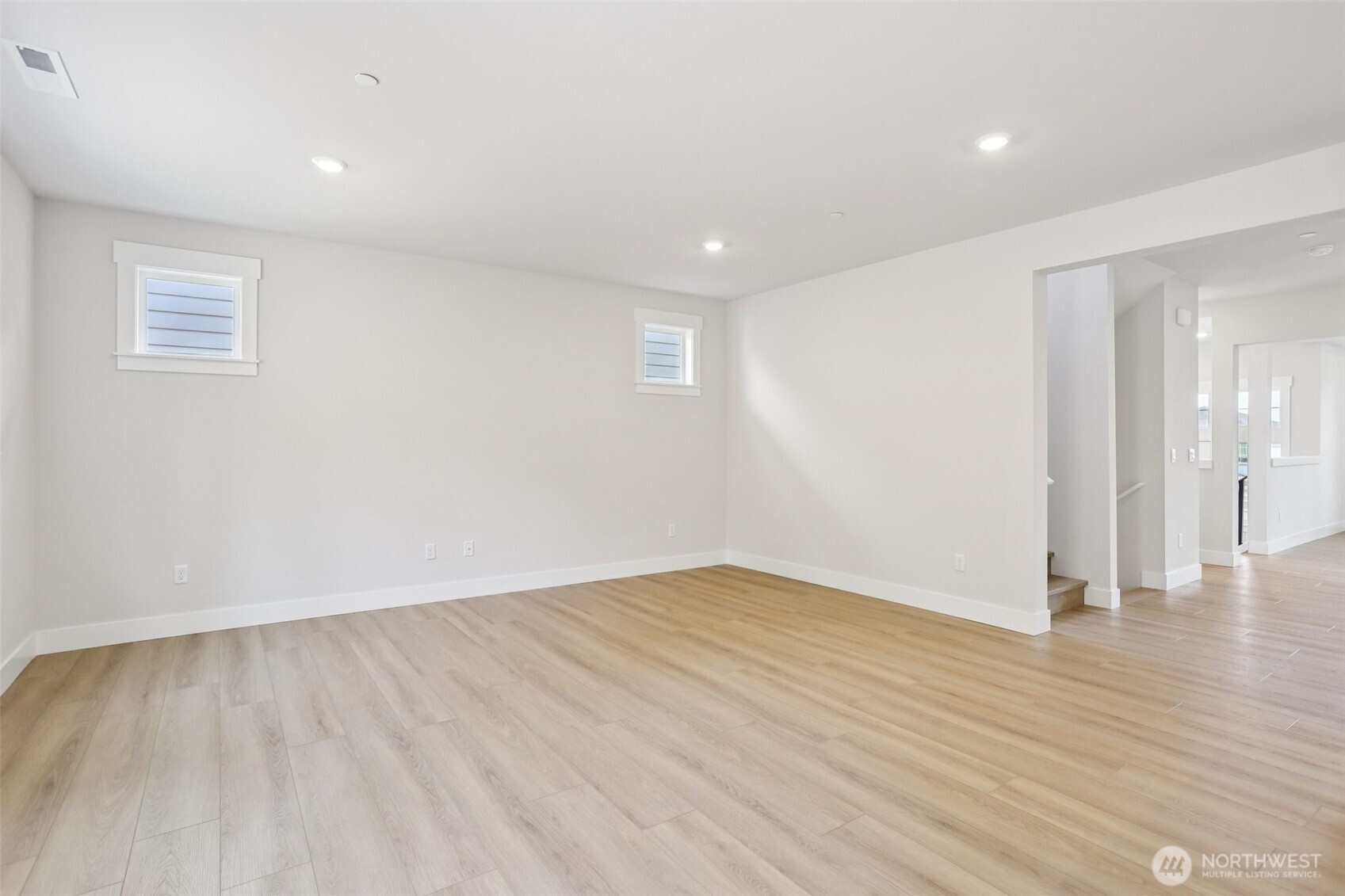 Looking from kitchen into adjoining family room.