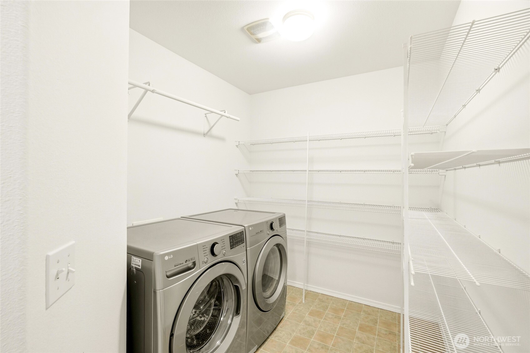 Oversized utility room and pantry for exceptional storage, an ideal drop zone for shoes, bags, and everyday essentials.