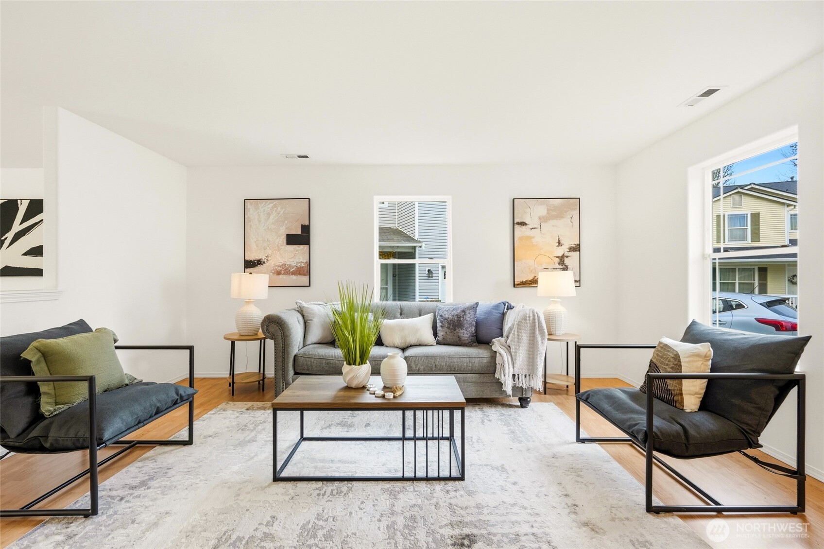 Bright, spacious living room right off the entry