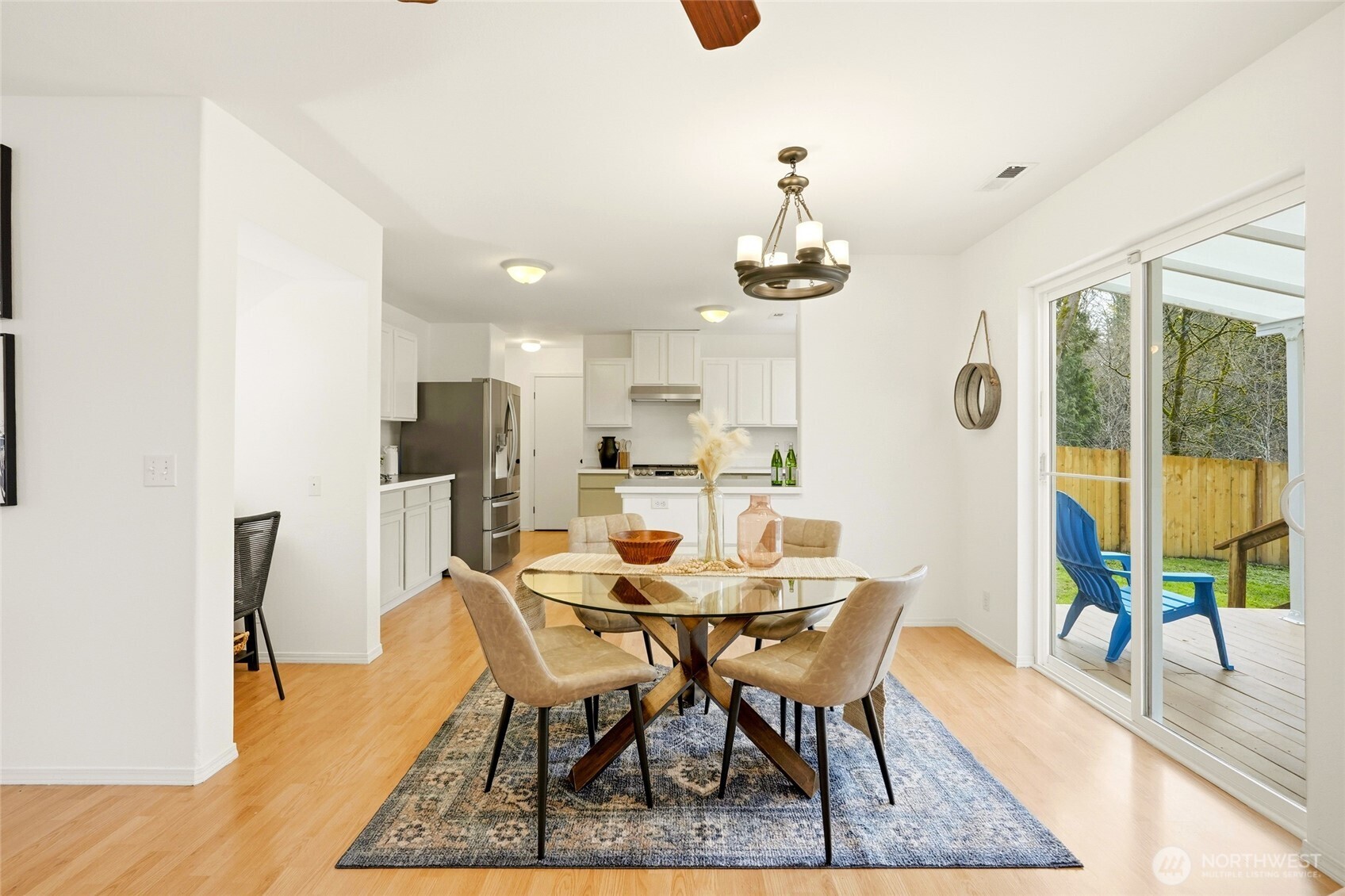 Generous dining space for both daily meals and gatherings. Open sightlines keep the space feeling connected.