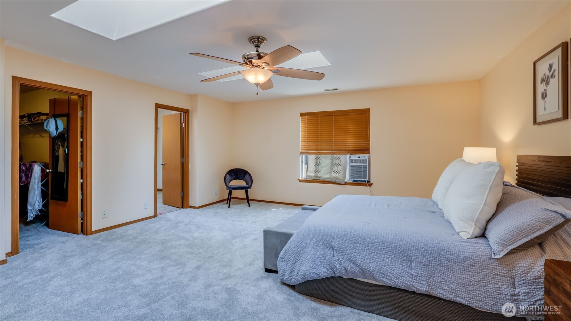 Step into the primary bedroom with direct access to a large walk-in closet and en suite bathroom, offering ultimate comfort and privacy