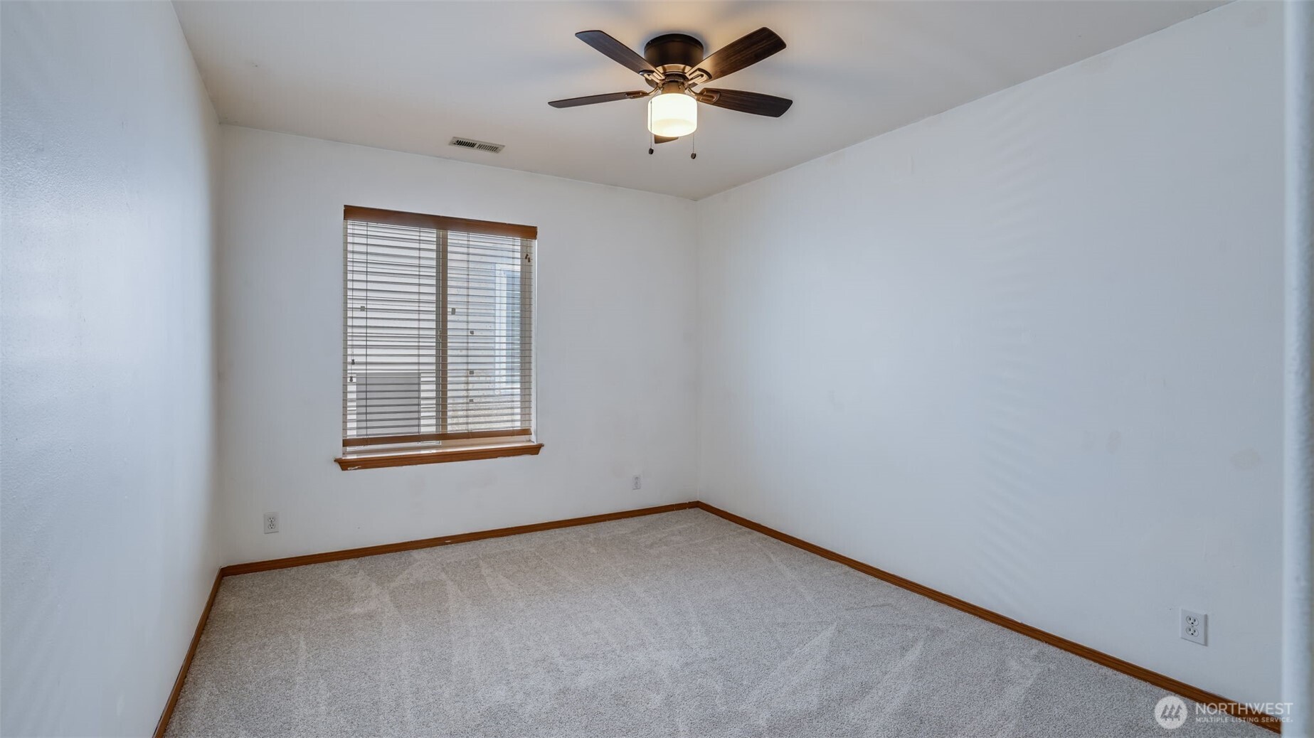 Lounge in the comfort of this fully carpeted upstairs bedroom