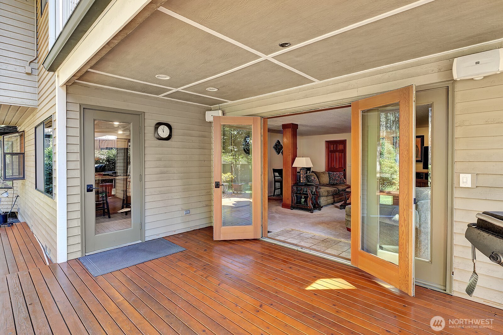French doors out onto covered deck