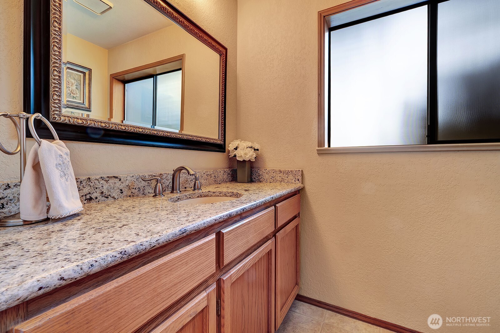 Guest bathroom with upgraded granite countertops
