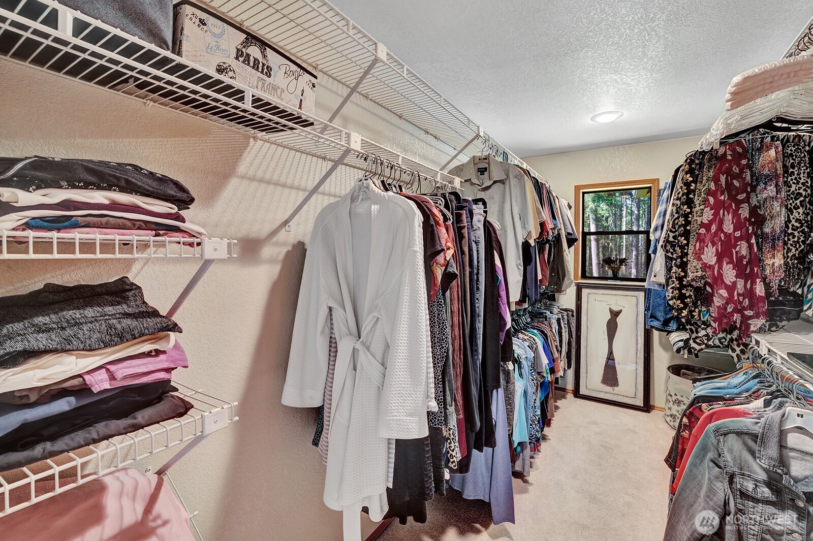Spacious walk-in-closet in Primary bedroom with organizers