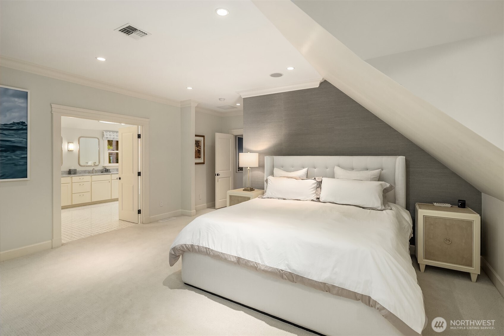 The primary suite offers two spacious walk-in closets and a couture bathroom.