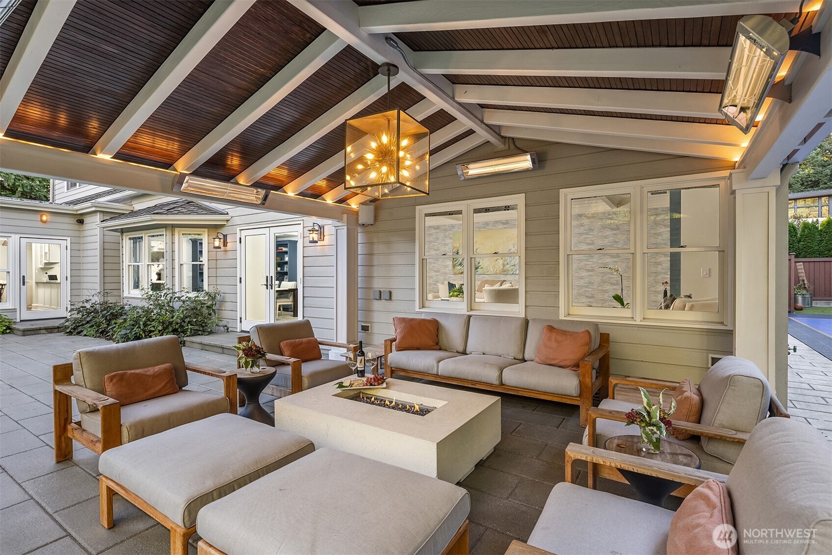 A charming, heated covered patio perfect for year-round entertaining.