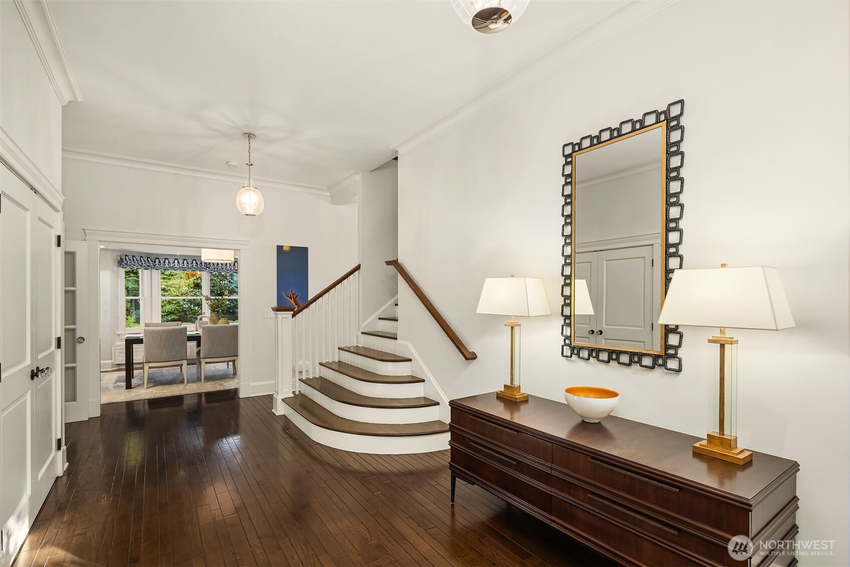 A gracious entry welcomes you into beautifully refreshed interiors that honor the home’s heritage while embracing modern luxury.