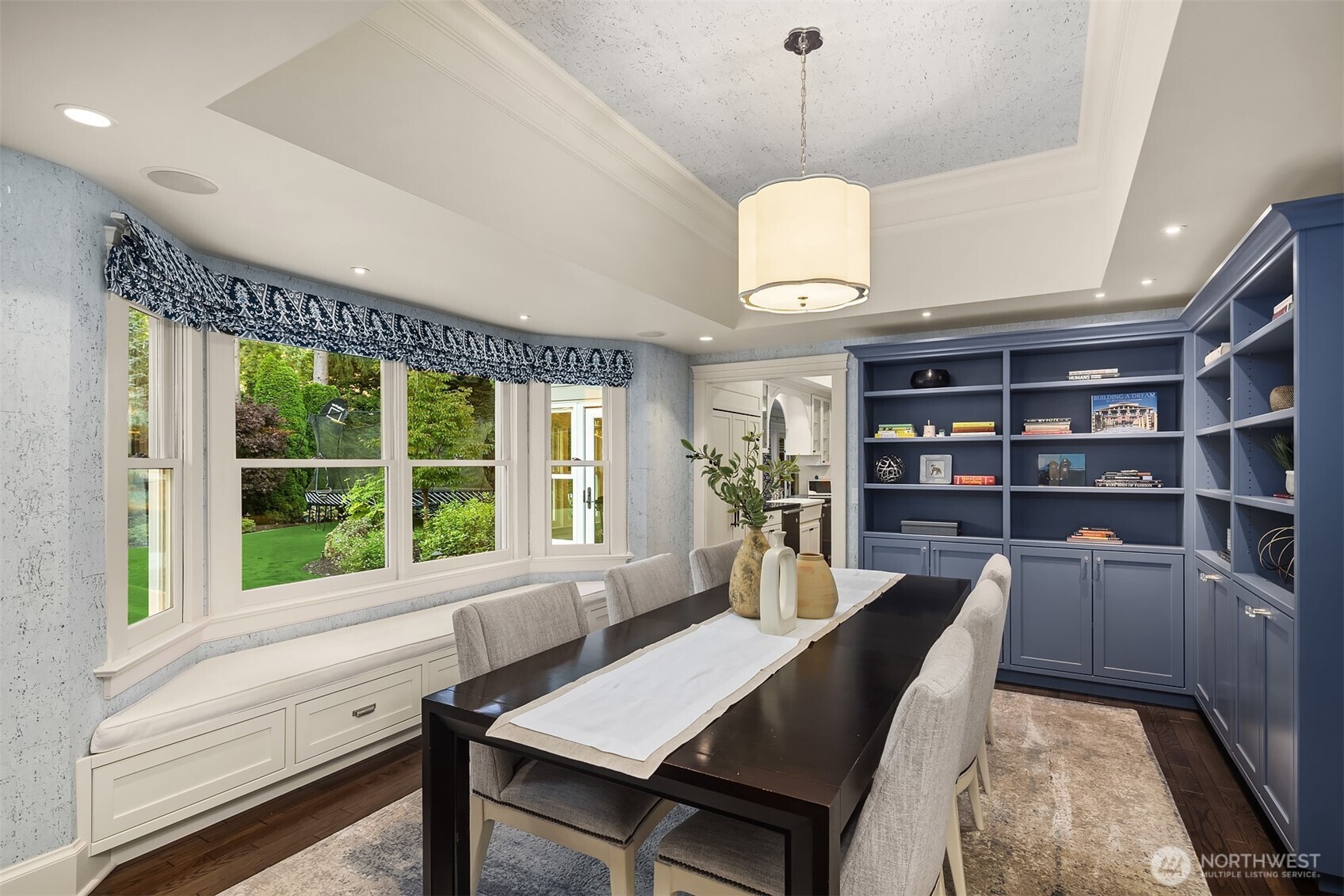 The perfect dining room with custom shelving.