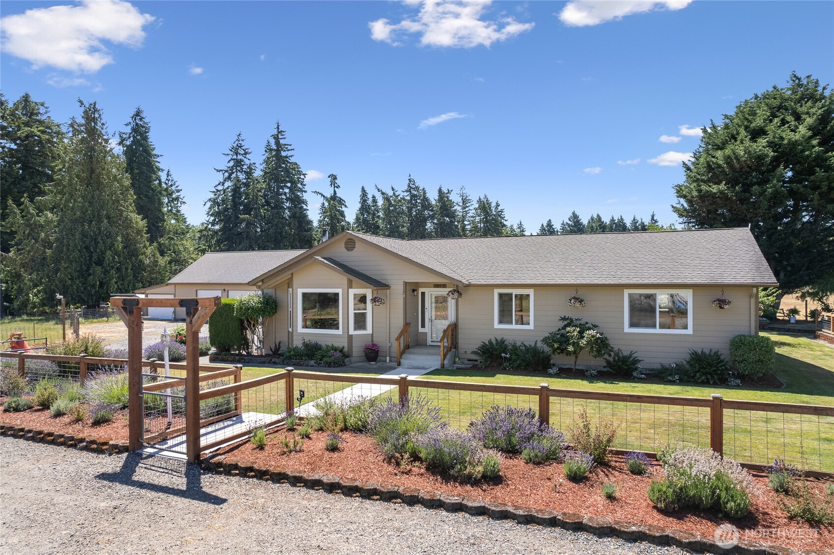 Beautiful dual-parcel property offering exceptional flexibility and space. One parcel features the home and detached garage, while the second includes pastures, a horse arena, and a barn, with effective field drainage designed to support year-round usability. The parcel with the barn is buildable for an additional residence and potential ADU, buyer to verify to their satisfaction. A rare opportunity in Tacoma.