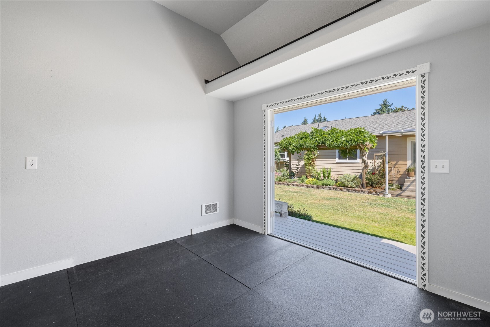 The creative cottage is heated and fully insulated, making it comfortable year-round. Six dedicated solar panels support efficient use, while built-in cabinetry and durable rubber mat flooring add functionality. French doors bring in natural light and charm, and a small loft offers additional storage or flexible creative space.