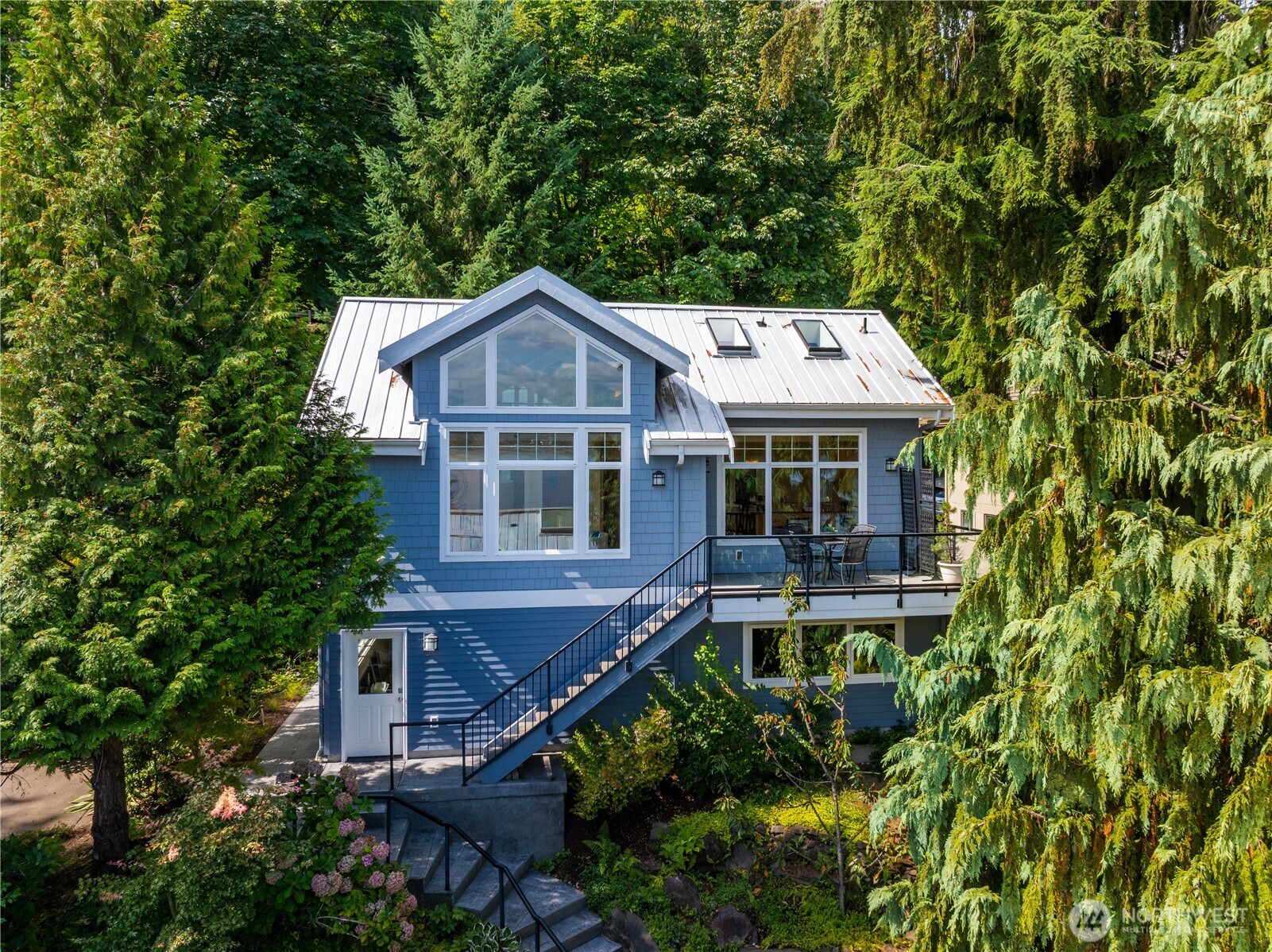 Detached 3-car garage with full ADU above