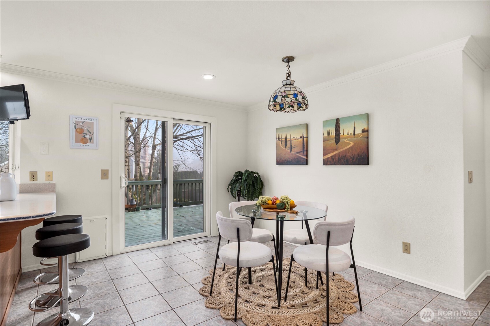 This Room gives Slider Access to the HUGE ~26x14 Deck and Fully-Fenced Backyard. The Deck is Gas-Plumbed for your grill.