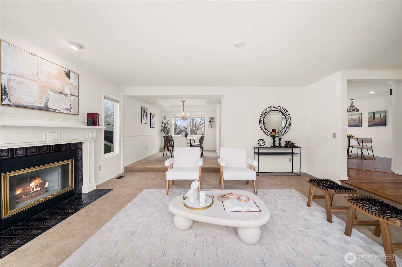 Black Glass Tile with White Millwork Mantel; Comfort and Class.