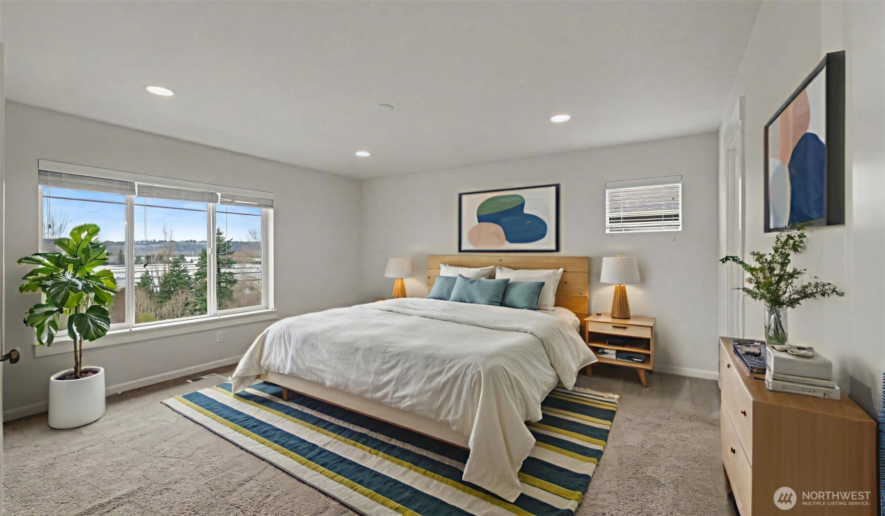 Primary bedroom with view.