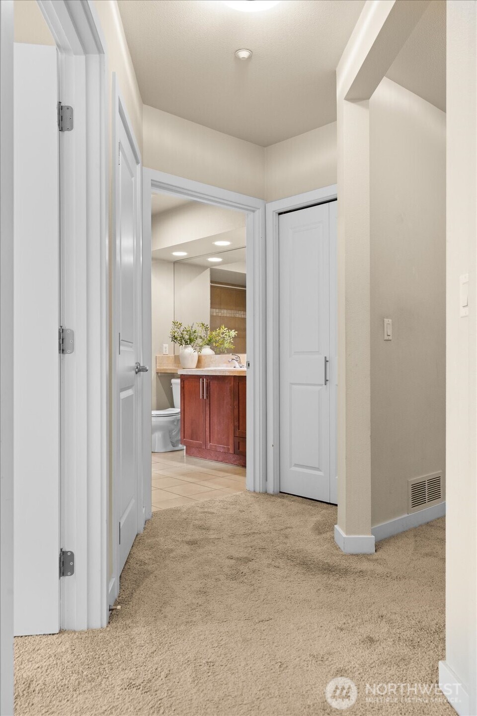 View from Kitchen to Bathroom Hallway