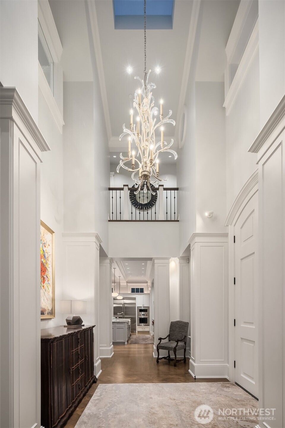 Rich, wide plank hardwoods, robust satin millwork and designer lighting offer incredible alchemy.