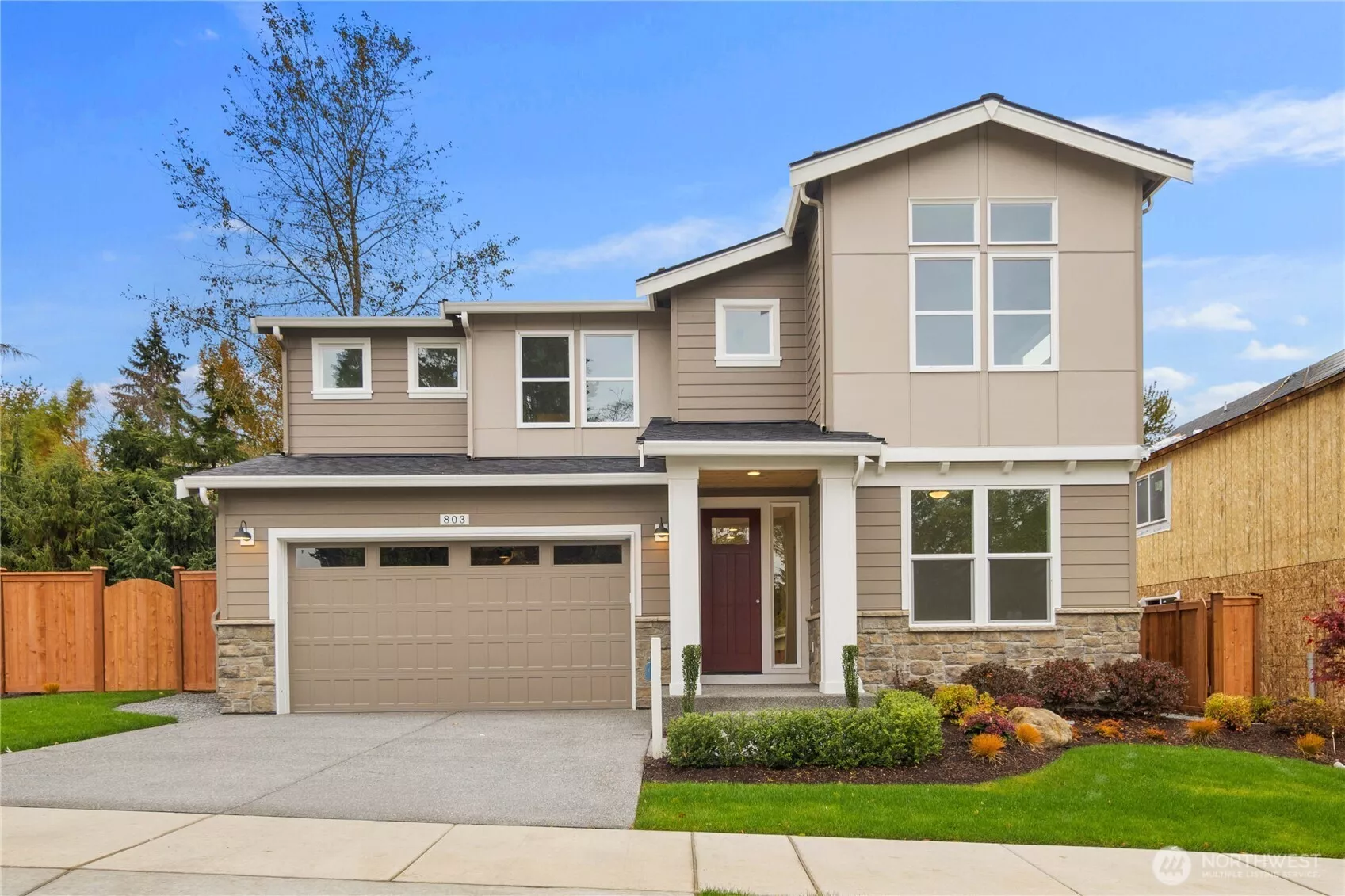 The Sloan plan showcases its modern Northwest architecture, clean rooflines, and elevated covered deck overlooking the community. Large windows flood the interior with natural light while the tall, multi-level design maximizes livability on every floor. Situated in Gooden Hollow, this home offers both style and convenience with quick access to everyday amenities and commuter routes.    These photos are from lot 3 at Gooden Hollow, the actual home for sale. However, other homes may vary, so all photos, renderings, site maps, and floorplans are for visualization purposes only. Plans, colors, building orientation, finishes, home outlook, and other details can and WILL vary.