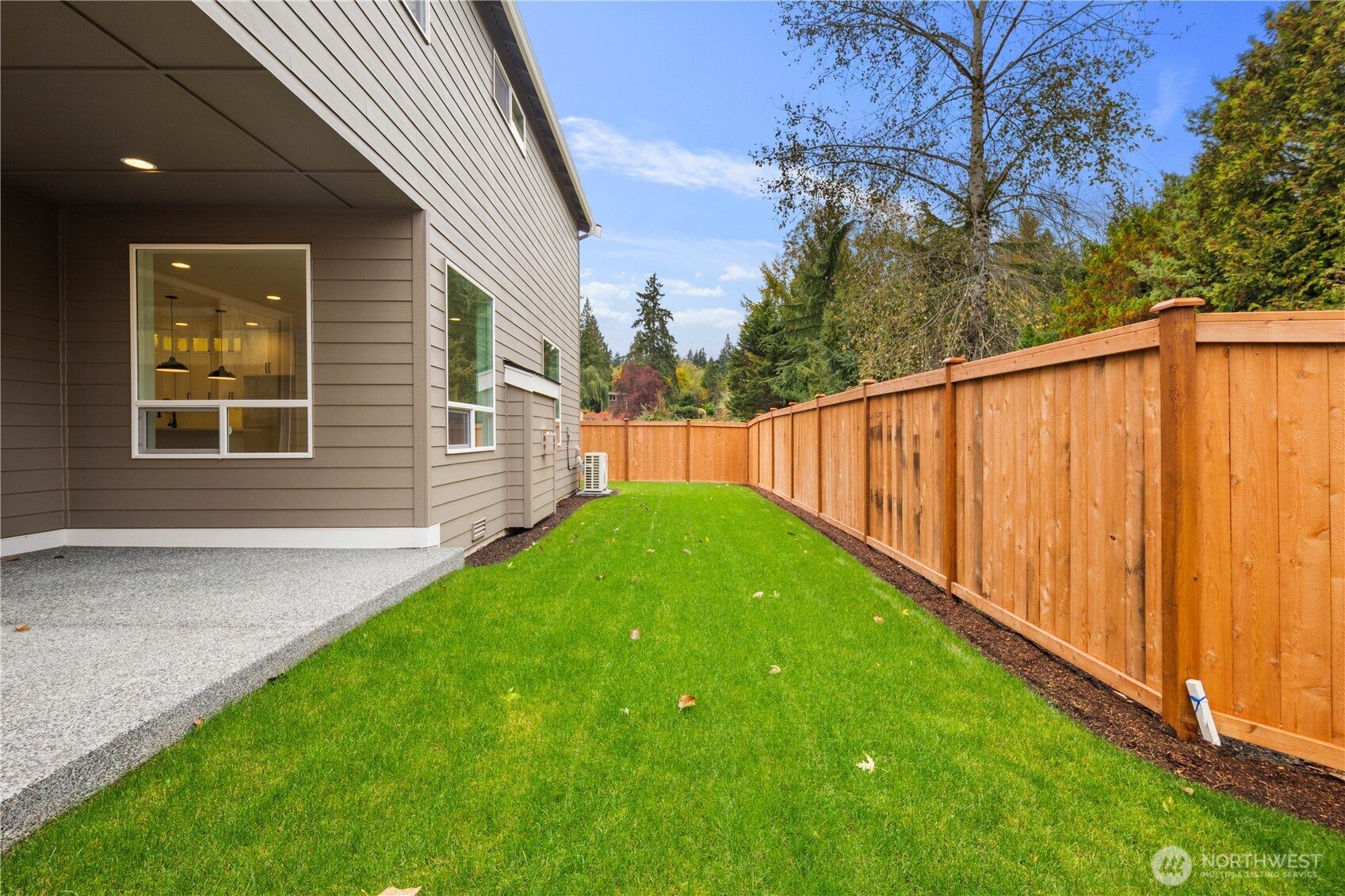 A fully fenced backyard with fresh sod and a long stretch of usable lawn, creating a private retreat for play, pets, or simple quiet moments. The space offers both openness and easy maintenance.    These photos are from lot 3 at Gooden Hollow, the actual home for sale. However, other homes may vary, so all photos, renderings, site maps, and floorplans are for visualization purposes only. Plans, colors, building orientation, finishes, home outlook, and other details can and WILL vary.