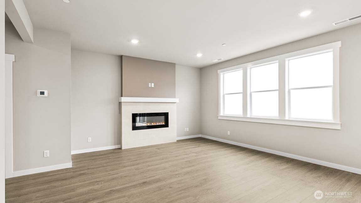 Plasma TV pre-wire w/ HDMI cable at great room, Home automation package includes deadbolt door lock, programmable thermostat, smart switches, video doorbell and smart speaker.