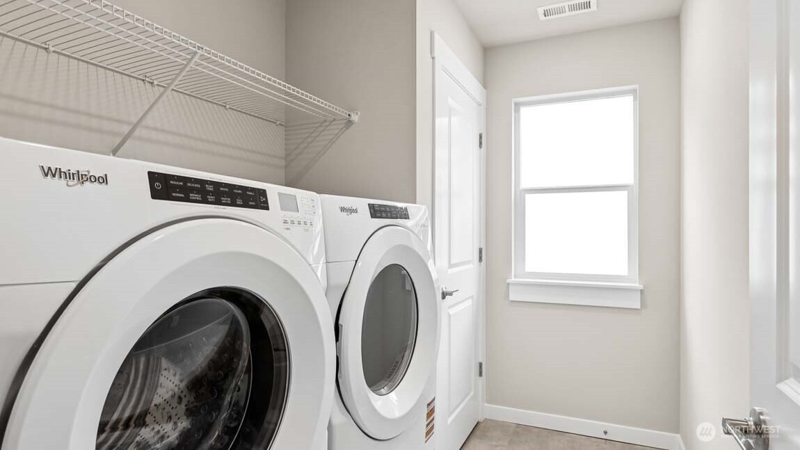 Spacious laundry room, washer & dryer are an option to add!