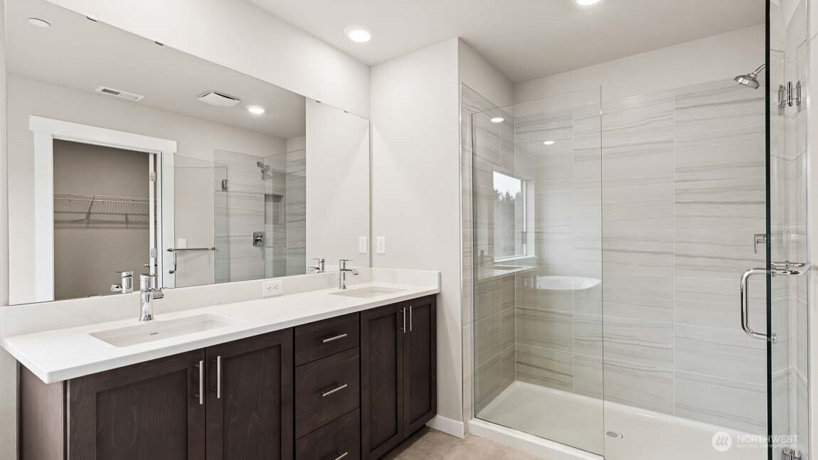 Five-piece spa bath, sizeable primary closet!