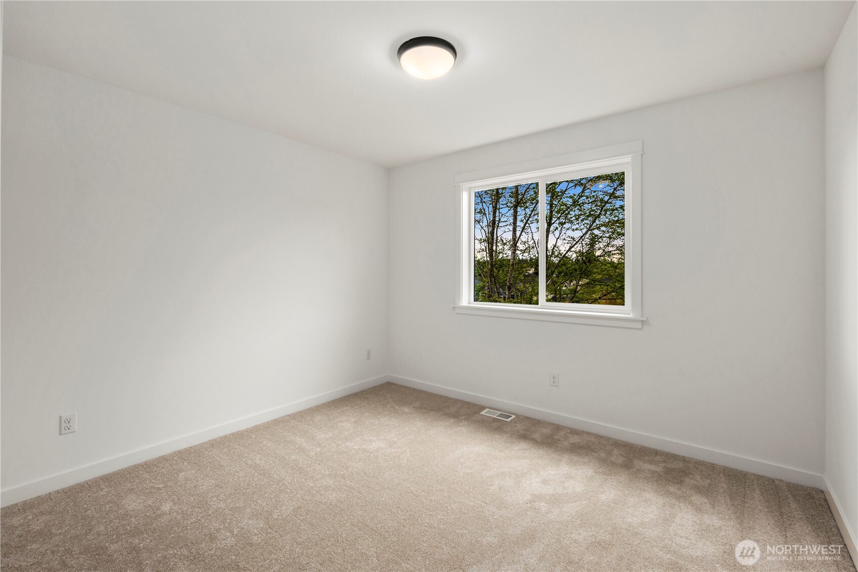 Additional Upper Level Bedroom: Bright secondary bedroom with neutral tones and plush carpet offers a versatile space ready for your needs. Large window brings in soft natural light, making it equally functional as a restful retreat or creative workspace.      Photos are from THIS model home at Foxmoore but are for visualization purposes only.