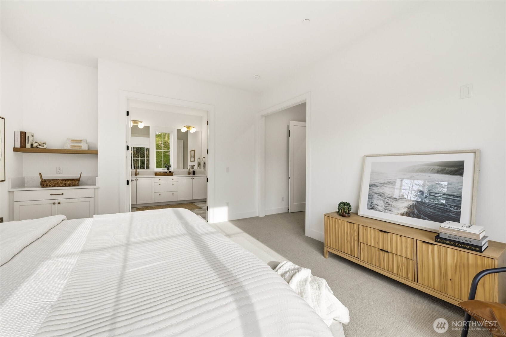 Main-floor guest suite that lives like a second primary—double vanity, oversized shower, and a generous closet which is ideal for guests or multigenerational living.