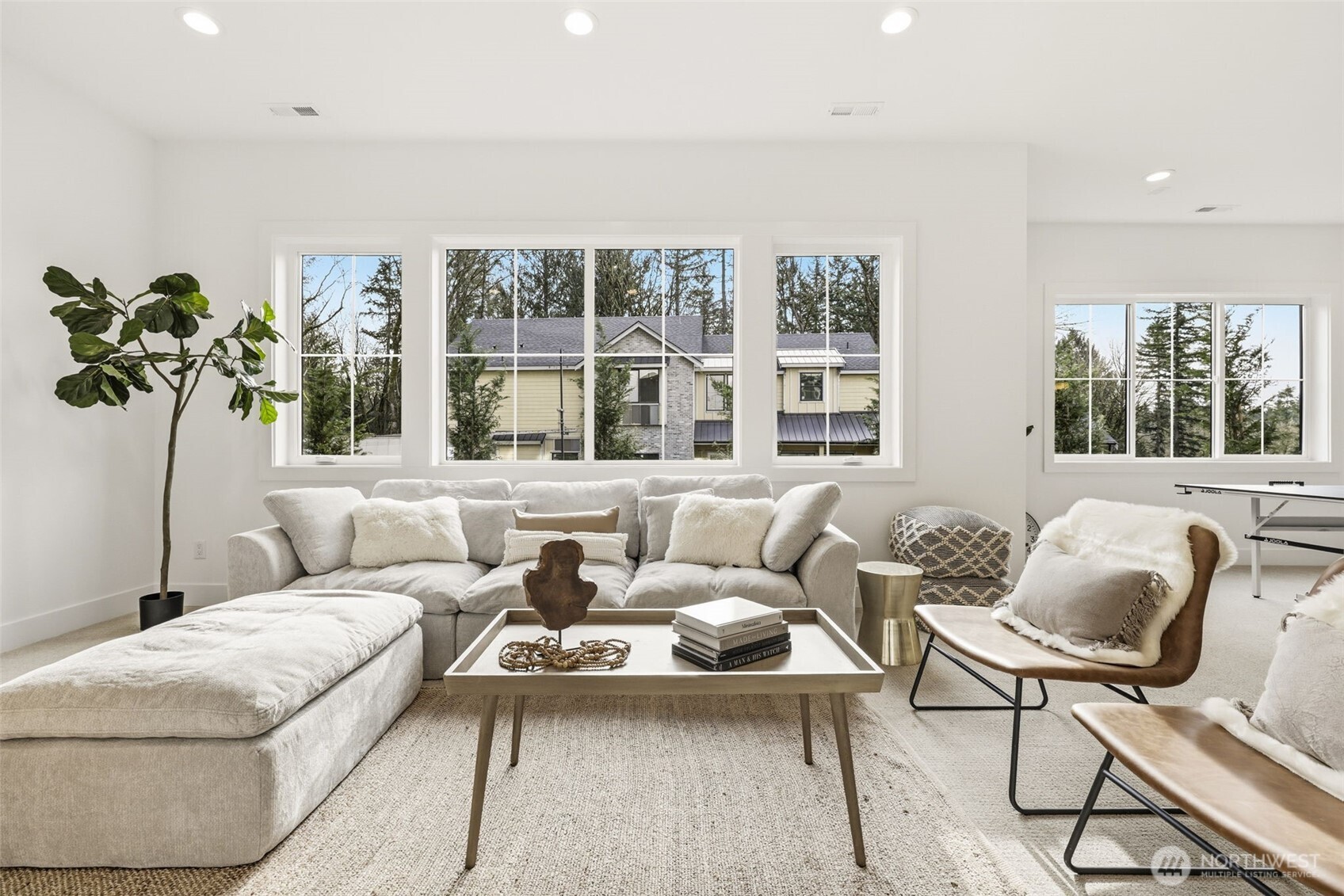 Expansive lower-level hangout with soaring 10-foot ceilings.