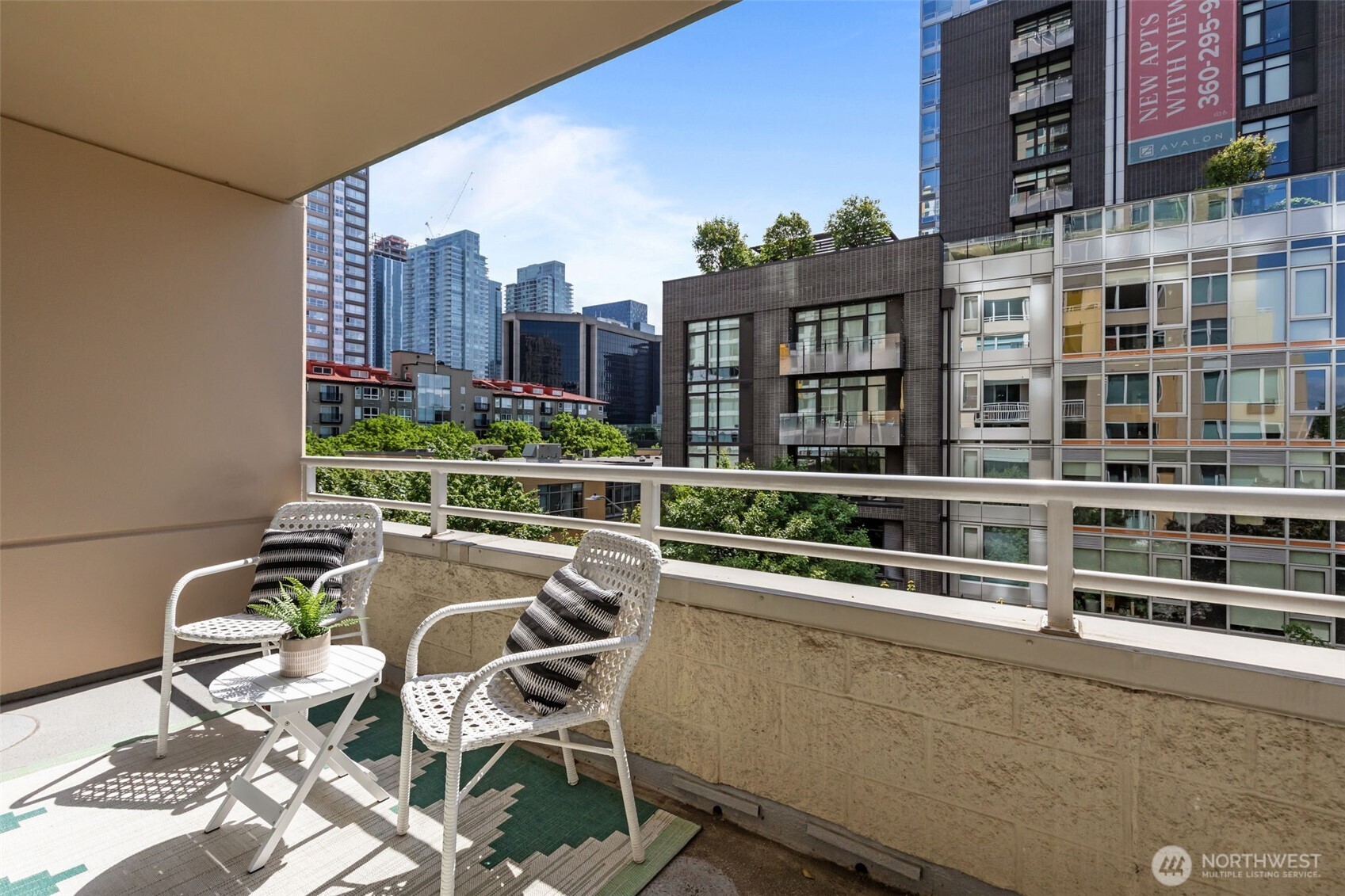 Wide balcony with dual access from living area and bedroom