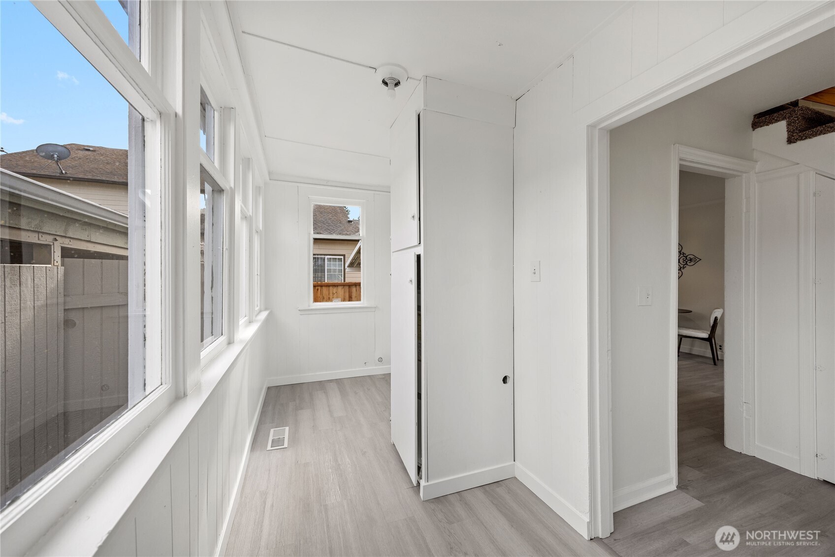 Main floor primary bedroom with attached primary bath.