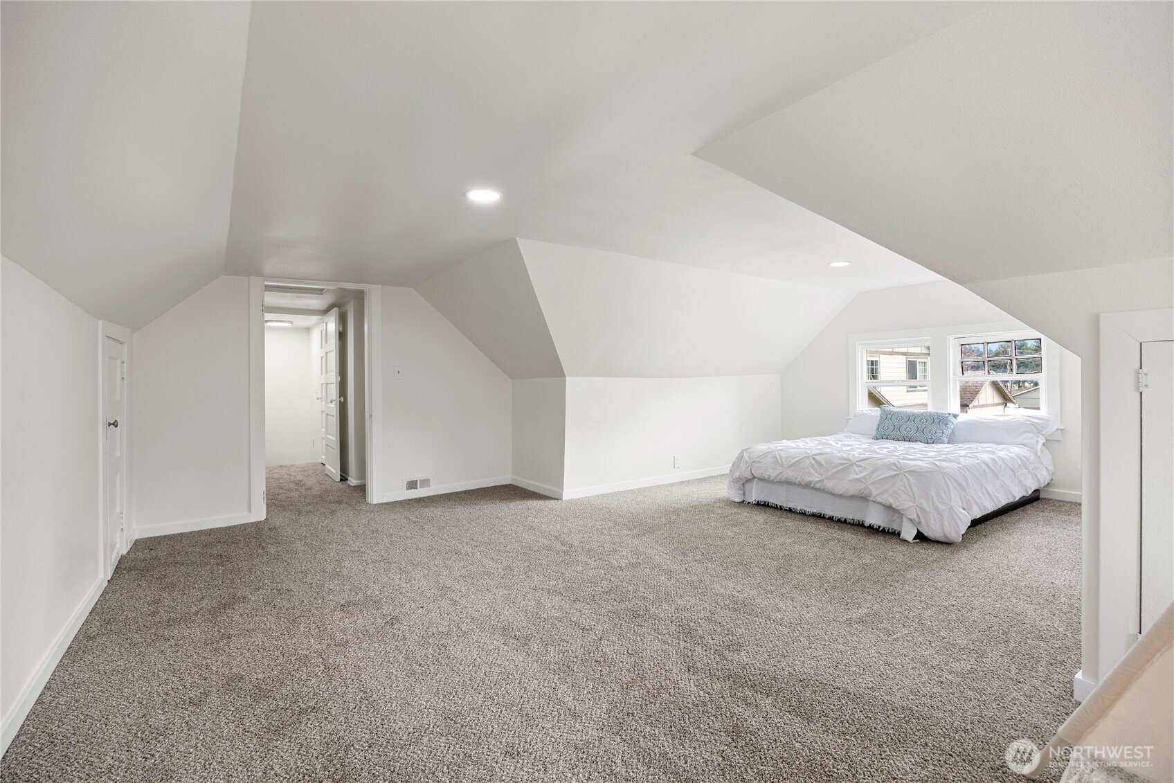 Plenty of "living space" in upstairs bedroom provides many possibilities.