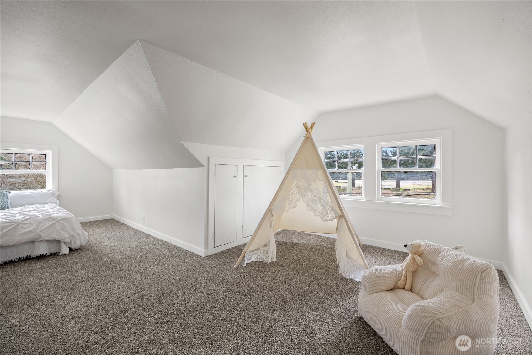 Another look at L shaped bedroom upstairs.