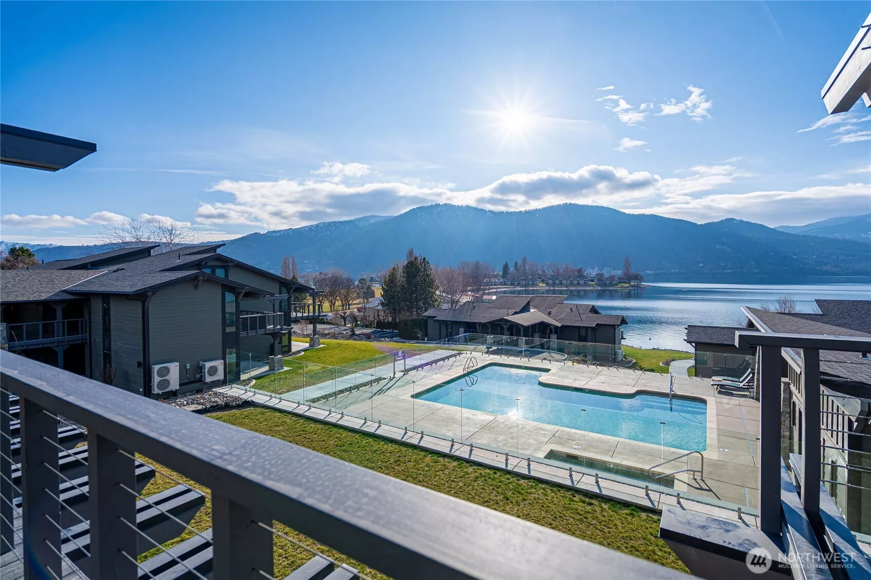 Yacinde F3 overlooks the redesigned pool area with sweeping Lake Chelan views from your deck.