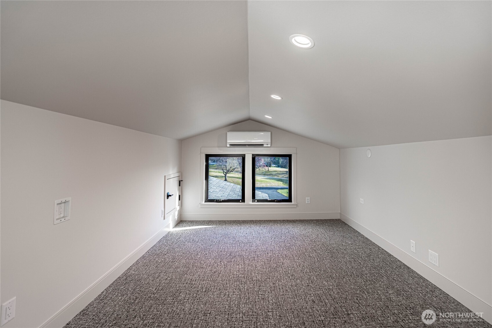 Loft sleeping area can accommodate several twin beds or one larger bed.