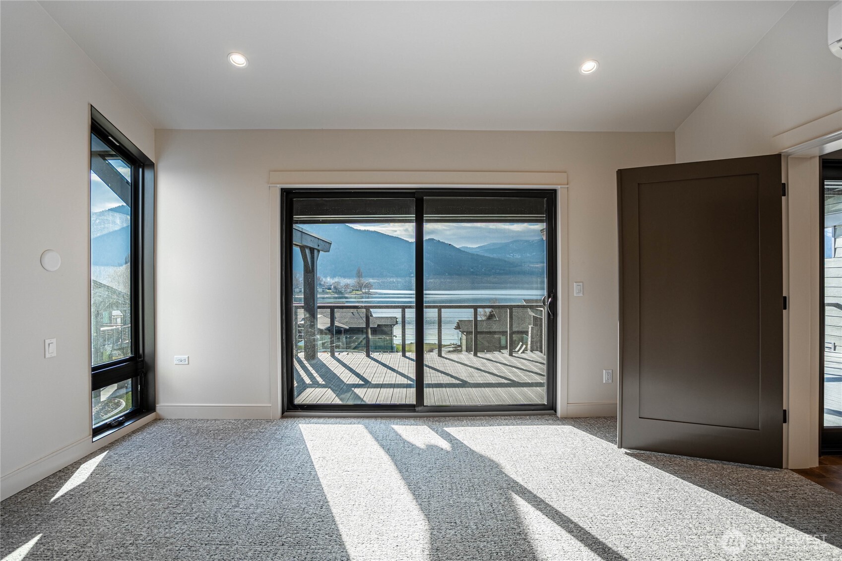 Primary bedroom is large enough for a king size bed and also features an en suite bathroom.