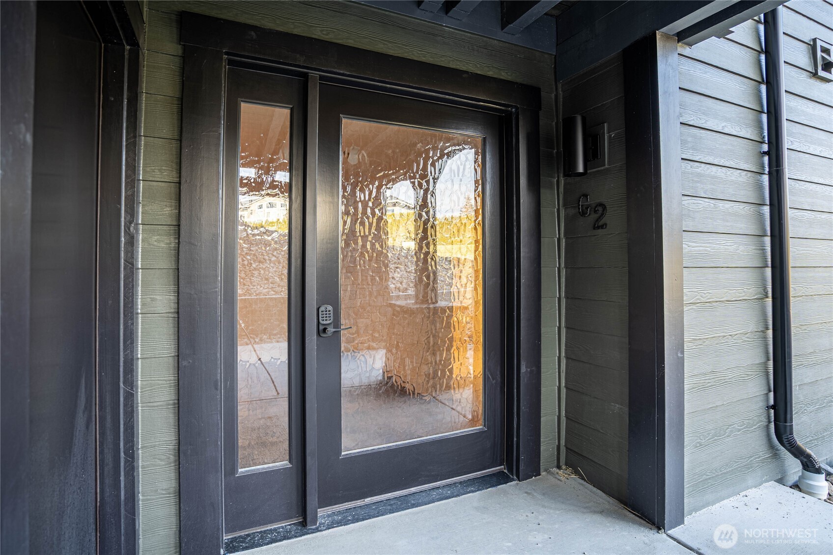 Frosted clearlight glass front door for privacy and light.