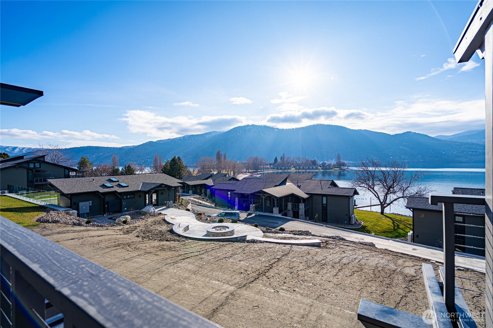 Yacinde G3 overlooks the new gas community firepit, with Lake Chelan views on the horizon.
