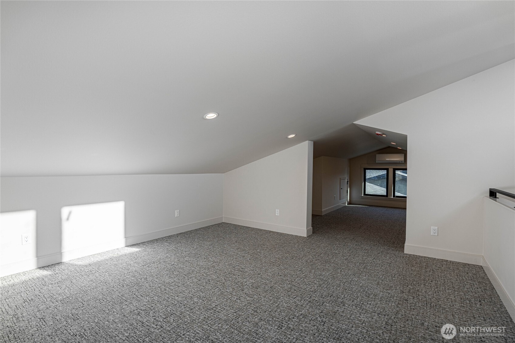 Bonus area in loft is perfect for an entertainment area.