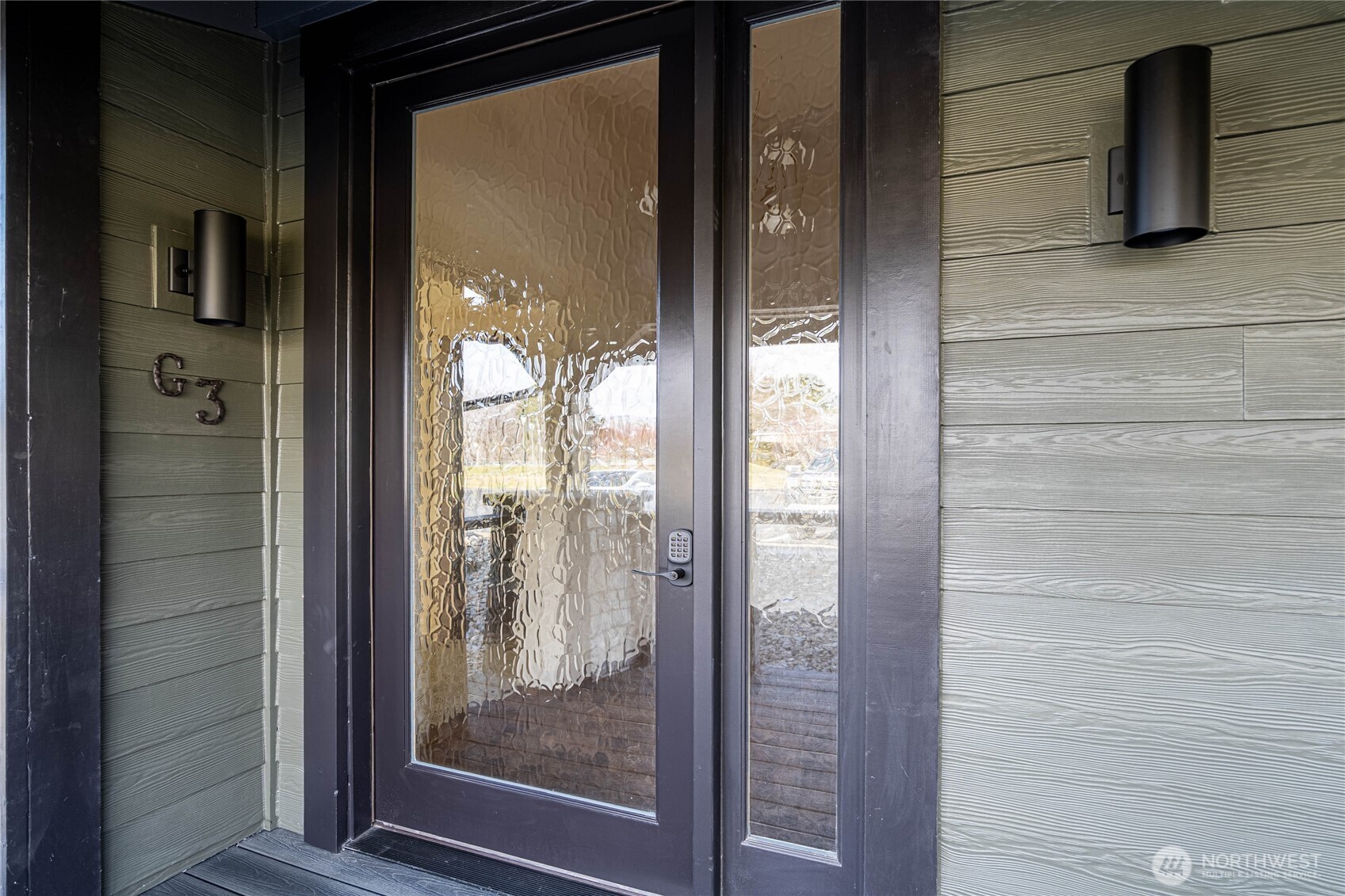 Frosted clearlight glass front door for privacy and light.
