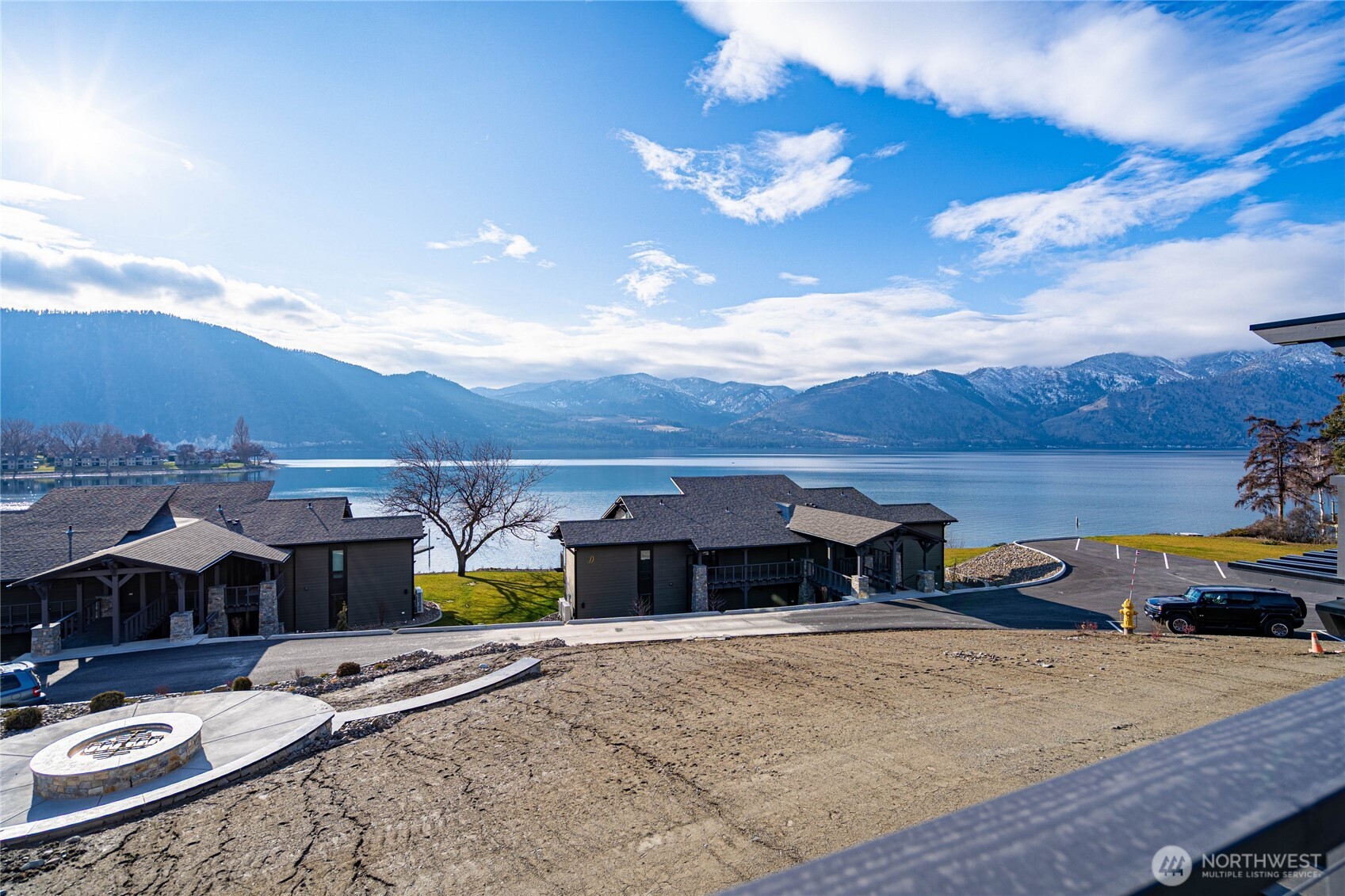 Glorious uplake views of Lake Chelan and the new lawn await.