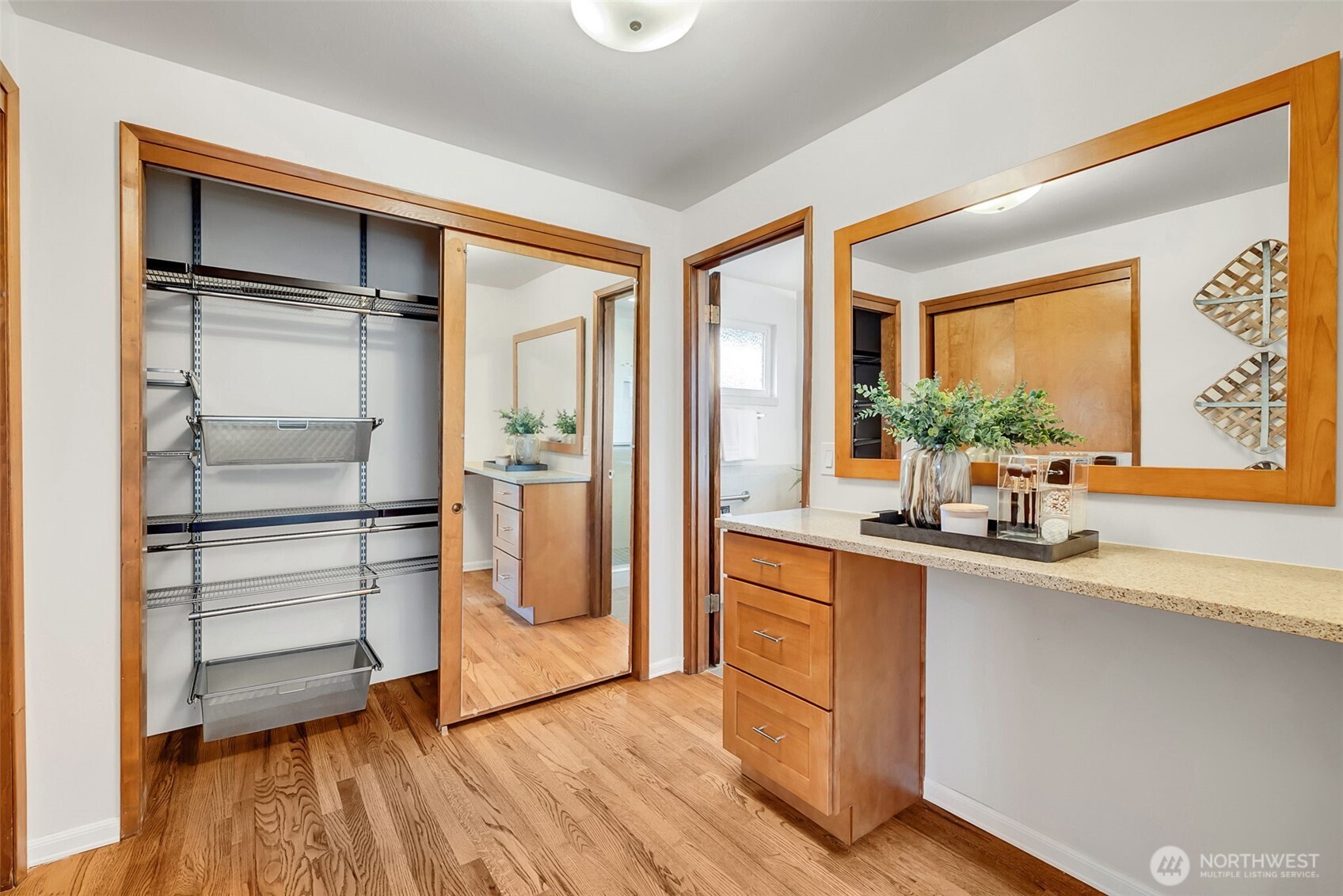Custom closet shelving in the primary bedroom to maximize storage