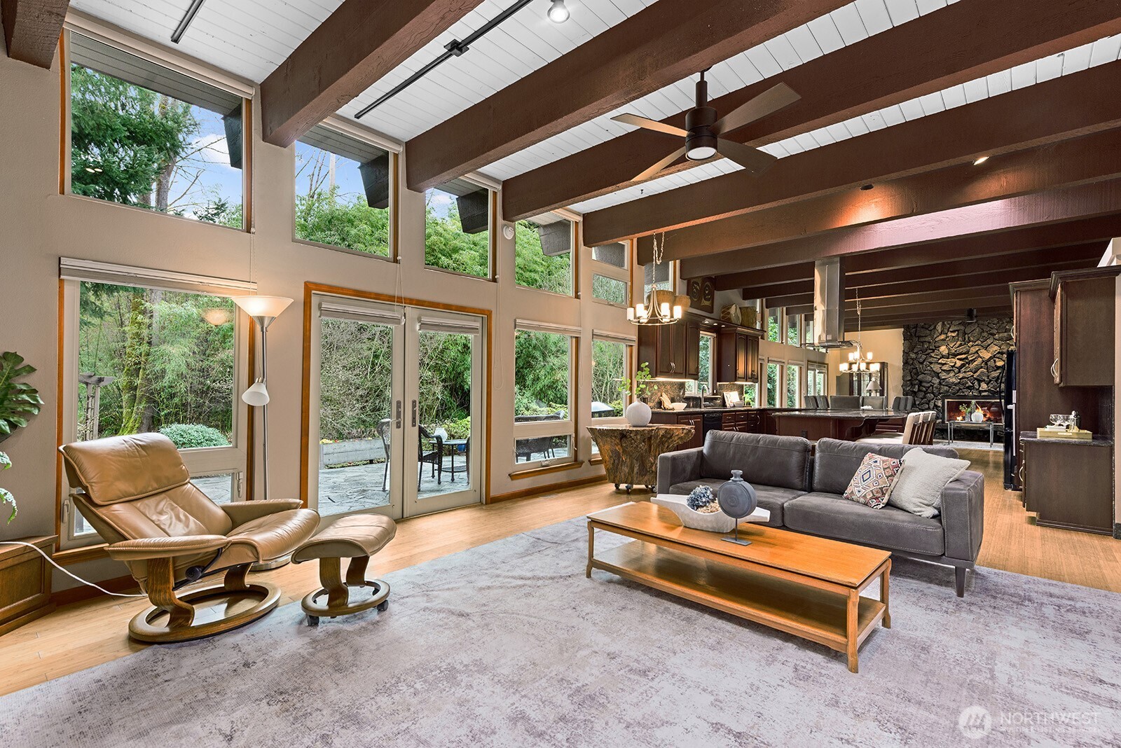 A more cozy balance to the formal living area or an extension of it, this large room is full of possibilities!